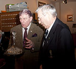 Derek presents Fred Patman with a decanter for 18 years as Chairman